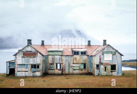 Old abandoned haunted house. Ruin at a fjord in Iceland. Stock Photo