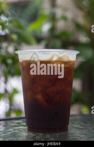 Sparkling Nitro cold brew coffee ready to drink in take away cup. Stock Photo