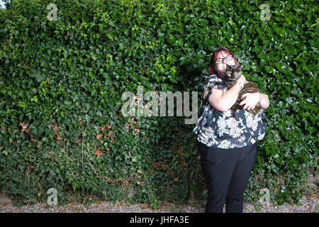 Claire Hopkins and her cat Tinks named Cat of the Year 2016 in annual National Cat Awards for saving her family from a house fire Stock Photo