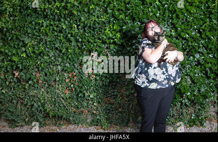 Claire Hopkins and her cat Tinks named Cat of the Year 2016 in annual National Cat Awards for saving her family from a house fire Stock Photo