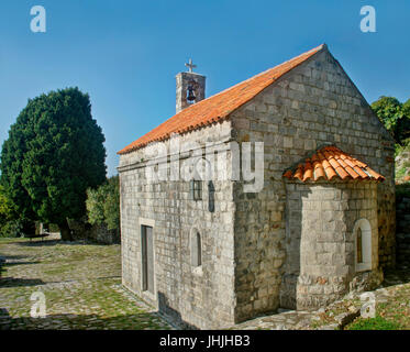 small medieval church and tree in stari bar, montenegro Stock Photo