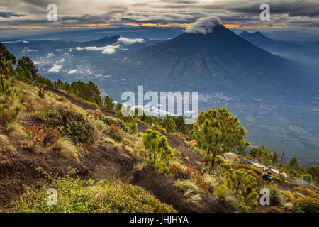 A view of volcan de agua and antigua from our campsite on acatenango Stock Photo