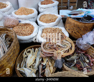 Traditional Asian fish market stall full of dried seafood in Inle Lake, Shan state, Myanmar (Burma). Close up. Stock Photo