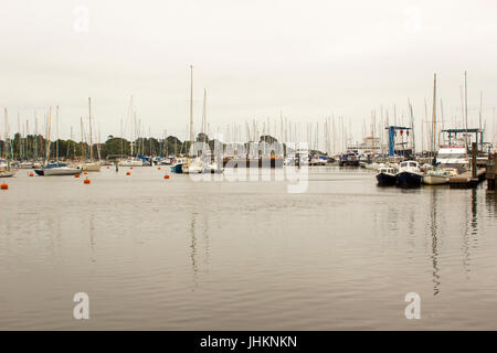 The crammed marina at Lymington Harbour home to the Royal Lymington Yacht Club. Taken on a dull grey summer's day in June Stock Photo