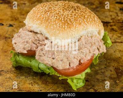 Tuna Salad Sesame Bread Roll or Bun Sandwich Sitting on an Oven Tray Stock Photo