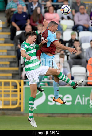 Burnley's Jonathan Walters and Shamrock Rovers' Tim Linthorst during the Pre-Season Friendly match at the Tallaght Stadium, Dublin. Stock Photo