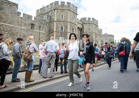 Windsor, UK. 14th July, 2017. Tourists queue to enter Windsor Castle. According to the Office for National Statistics (ONS), the number of tourists visiting the UK in the first three months of 2017 rose by 21.1% as a result of the weakness of the pound. Credit: Mark Kerrison/Alamy Live News Stock Photo