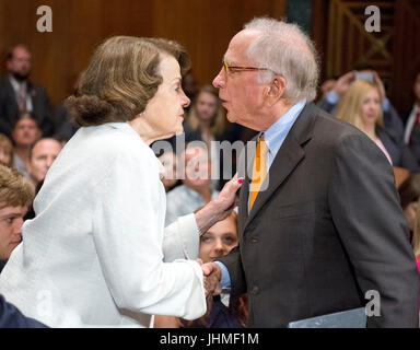 Washington, Us. 12th July, 2017. United States Senator Dianne Feinstein (Democrat of California), left, welcomes former US Senator Sam Nunn (Democrat of Georgia) prior to Christopher A. Wray testifying on his nomination to be Director of the Federal Bureau of Investigation (FBI) before the US Senate Committee on the Judiciary on Capitol Hill in Washington, DC on Wednesday, July 12, 2017. Credit: Ron Sachs/CNP (RESTRICTION: NO New York or New Jersey Newspapers or newspapers within a 75 mile radius of New York City) - NO WIRE SERVICE - Photo: Ron Sachs/Consolidated/dpa/Alamy Live News Stock Photo