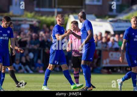 Taff's Well, Wales, UK. 15th July 2017. Anthony Pilkington of Cardiff City (centre left) is congratulated by Sol Bamba after scoring his side's opening goal during the pre-season friendly match between Taff's Well FC and Cardiff City at the Rhiw'r Ddar stadium, Taff's Well, Wales, UK.  Picture by Mark Hawkins Credit: Mark Hawkins/Alamy Live News Stock Photo