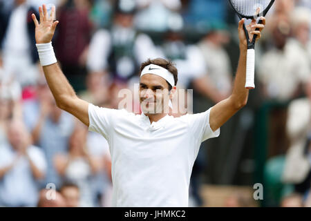 London, UK. 14th July, 2017. Roger Federer of Switzerland celebrates after winning the men's singles semifinal match with Tomas Berdych of the Czech Republic at the Championship Wimbledon 2017 in London, Britain on July 14, 2017. Roger Federer won 3-0. Credit: Han Yan/Xinhua/Alamy Live News Stock Photo