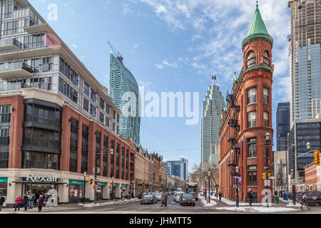 Red-brick Gooderham Building with street view in background , Gooderham Building is a historic landmark of Toronto, O