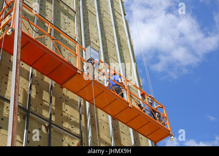 Teams of construction engineers working on the glazing of the new Perinatal Medical Center in Tambov Stock Photo