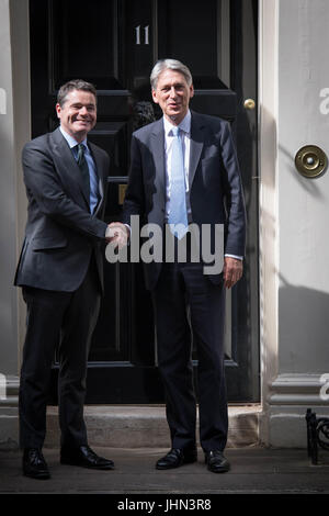 Chancellor Philip Hammond (right) greets Irish Finance Minister Paschal Donohoe outside 11 Downing Street, London, ahead of talks. Stock Photo