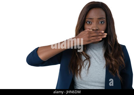 Close up of shocked businesswoman against white background Stock Photo