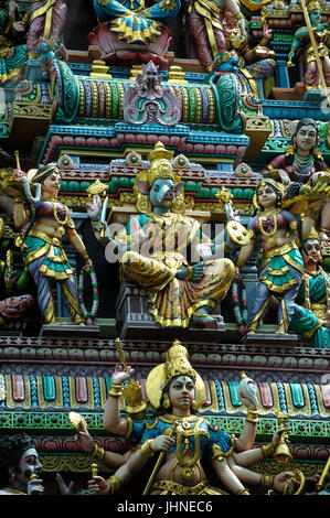 Ornate statues on the Gopuram (gate tower) of the Sri Veeramakaliamman Temple, Serangood Road, Little India, Singapore Stock Photo