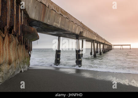 Under Pacifica Municipal Pier at Sunset. Stock Photo