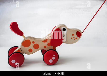 Pull along wooden dog toy Stock Photo