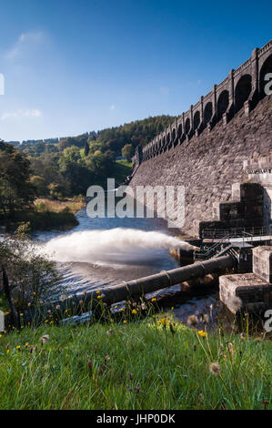 Lake Vyrnwy Dam With Water Compensation Release Valves Open, Wales Stock Photo