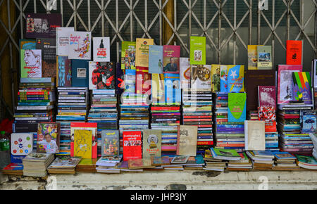 Yangon, Myanmar - Feb 13, 2017. Selling books at downtown in Yangon, Myanmar. Yangon is a city that balances tradition, culture and modernity. Stock Photo