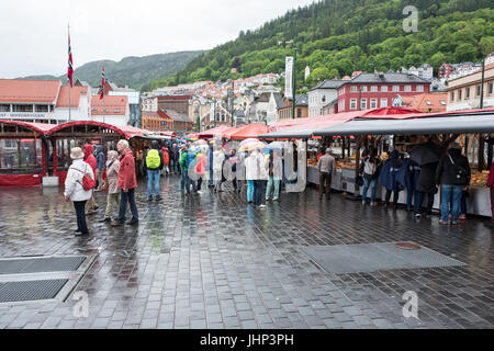 The picturesque Fish Market in Bergen is one of Norway's most visited outdoors markets. The Fish Market sells seafood, fruit and vegetables. Stock Photo
