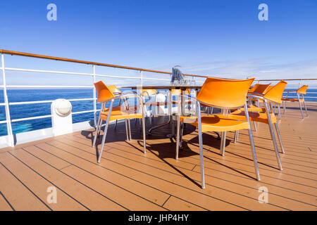 Outdoor area of the BELLA DONNA Restaurant aboard AIDAsol. AIDA Cruises is one of ten brands owned by Carnival Corp. Stock Photo