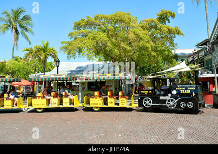 Key West Conch Tour Train taking tourists around the tourist attractions Stock Photo