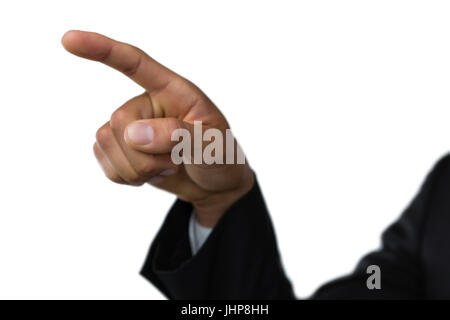 Cropped hand on businessman pointing against white background Stock Photo