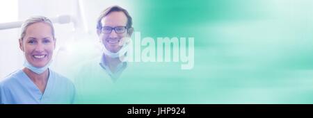 Digital composite of Two dentists smiling and blurry teal transition Stock Photo