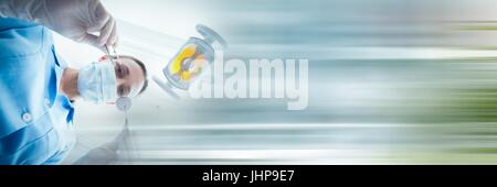 Digital composite of Low angle of dentist about to work on patient and blurry blue transition Stock Photo