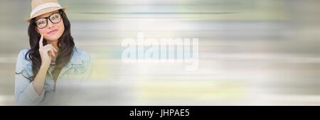 Digital composite of Thinking woman in hat with motion transition Stock Photo