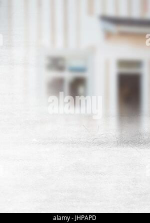 Digital composite of Construction Worker with pen chart in front of construction site Stock Photo