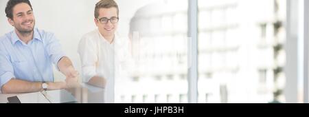 Digital composite of Business people having a meeting with buildings transition effect Stock Photo