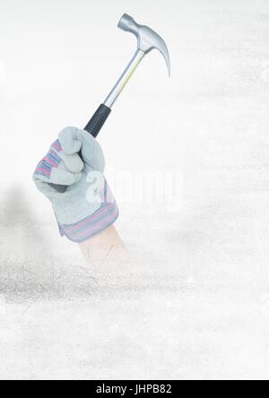 Digital composite of Hand with hammer on building site with transition effect Stock Photo