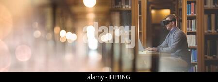 Digital composite of Man Wearing VR Headset in library with transition Stock Photo