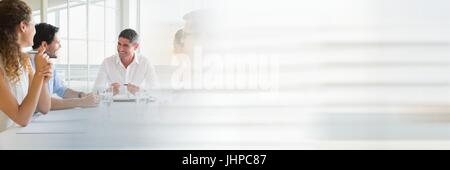 Digital composite of Business people having a meeting with transition effect Stock Photo