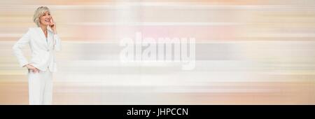 Digital composite of Thinking businesswoman with soft colors transition Stock Photo
