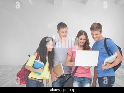 Digital composite of Group of students standing in front of blank room background Stock Photo