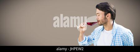 Digital composite of Man tasting wine against brown background Stock Photo