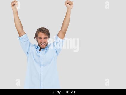 Digital composite of Portrait of Man celebrating with grey background Stock Photo