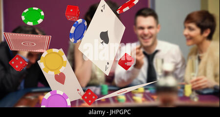 3D image of playing cards with casino tokens and dice against winner and loser at roulette table Stock Photo