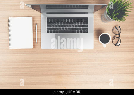 laptop computer desk on top view in retro color style Stock Photo