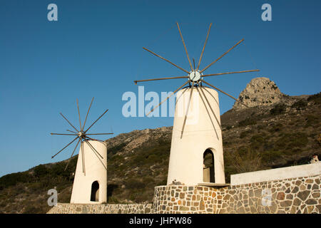 Windmills were used to grind the wheat cultivated at the Lasithi plateau, a karst plain at an elevvation around 840 meter above the sea in Crete. Stock Photo