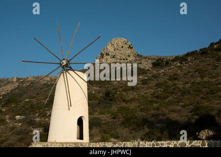 Windmills were used to grind the wheat cultivated at the Lasithi plateau, a karst plain at an elevvation around 840 meter above the sea in Crete. Stock Photo