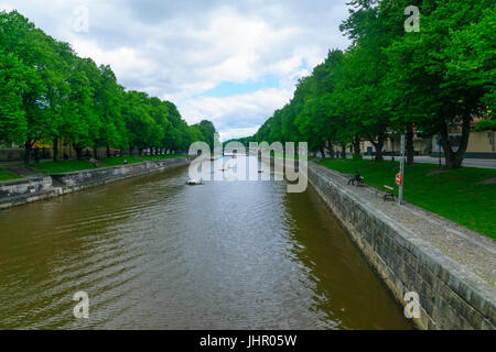 TURKU, FINLAND - JUNE 23, 2017: View of the Aura river, with locals and visitors, in Turku, Finland Stock Photo