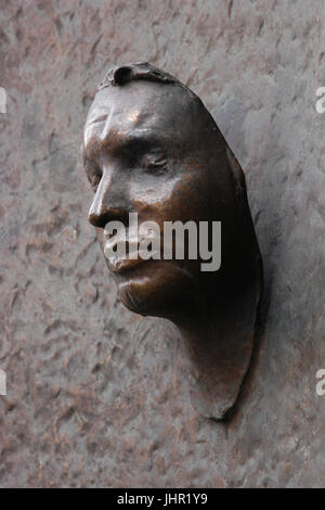 Death mask of Jan Palach taken by Czech sculptor Olbram Zoubek installed on the main building of the Faculty of Arts of the Charles University in Prague, Czech Republic. Jan Palach was a student who committed suicide by self-immolation on 16 January 1969 as a protest against the Soviet invasion to Czechoslovakia on 21 August 1968. He studied in the Faculty of Arts of the Charles University. Stock Photo