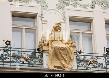 Princess Libuše depicted on the balcony of the House at the Golden Nail (Dům u zlatého hřebíku) in Karlova Street in Staré Město (Old Town) in Prague, Czech Republic. Stock Photo