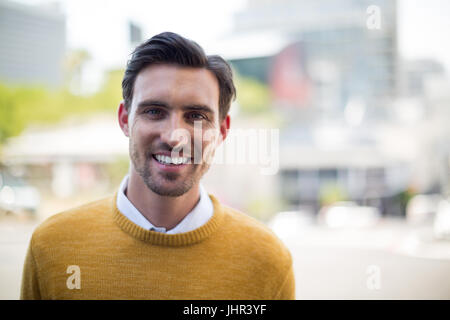 Close-up of smiling man looking at camera Stock Photo
