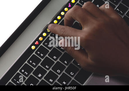 close-up hand touching on laptop computer Stock Photo