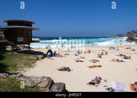 People enjoying the sunshine on Tamarama Beach, Sydney, New South Wales, Australia Stock Photo