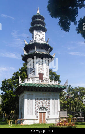 Chinese clock tower in Lumphini park, Bangkok, Thailand Stock Photo